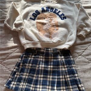 Zara Cream Sweatshirt with Blue 'Los Angeles' Lettering and plaid kilt skort.